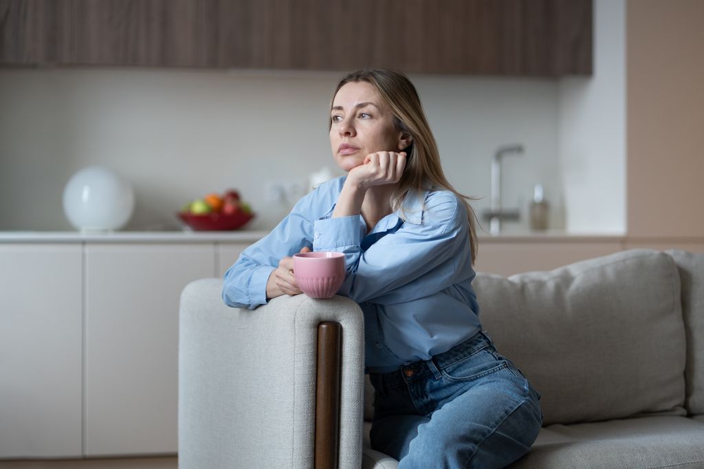 middle aged woman feeling no joy