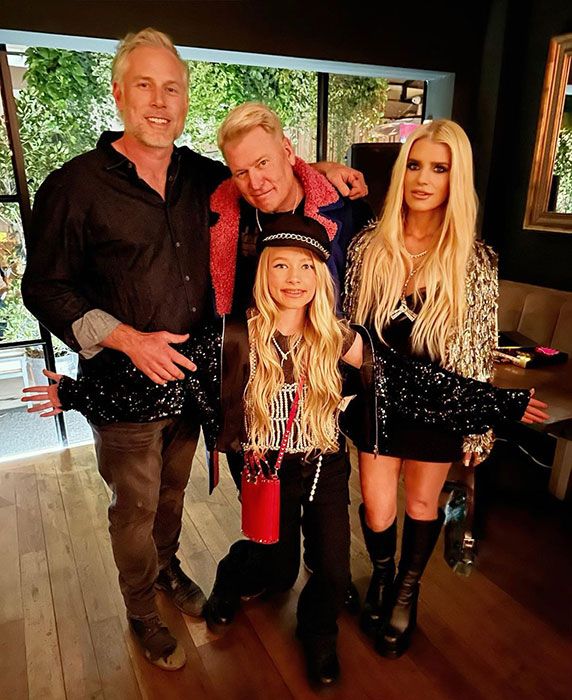 Jessica Simpson with her husband Eric, daughter Maxwell, and father Joe