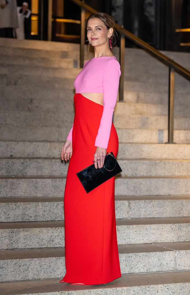 katie holmes with a pink/red dress