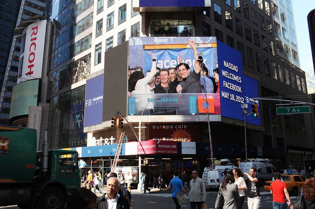 Facebook founder Mark Zuckerberg is seen on a screen in Times Square moments after he rang the Opening Bell for the Nasdaq stock market board from Menlo Park on May 18, 2012 in New York, United States