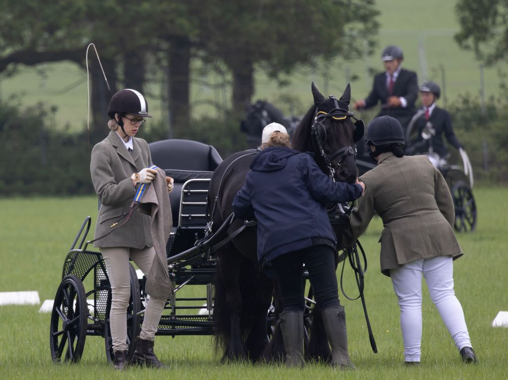 Lady Louise puts on carriage driving coat 
