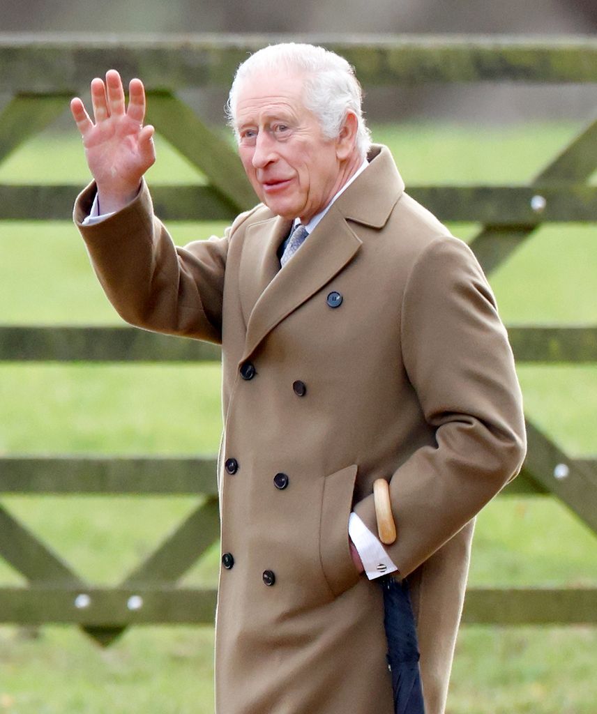 King Charles waving on way to church