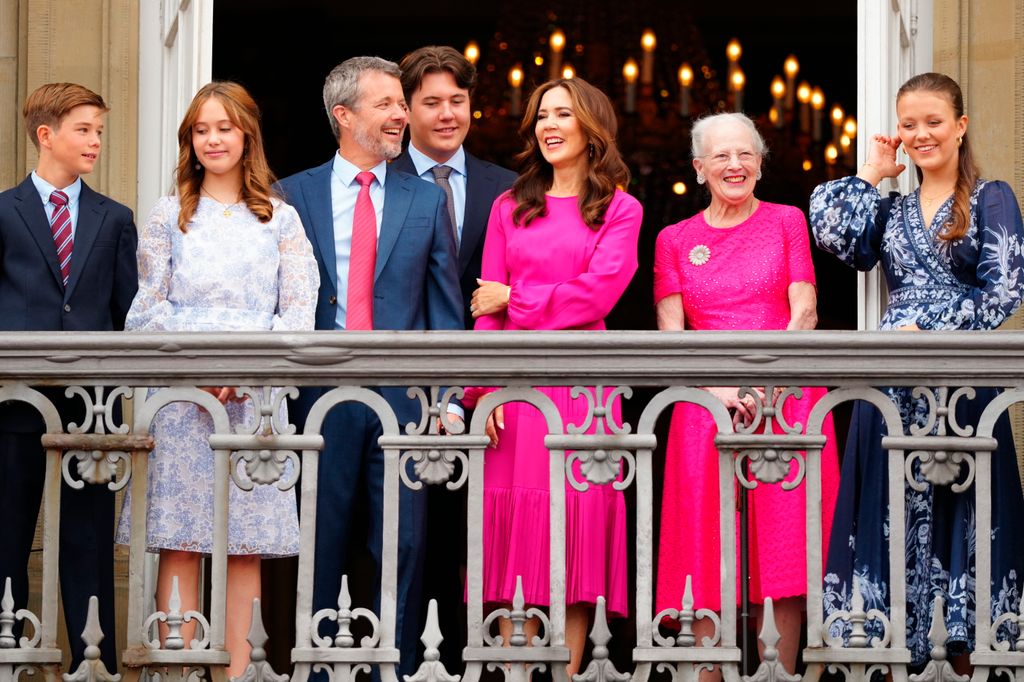 Prince Vincent, Princess Josephine, Crown Prince Christian, Queen Mary, Queen Margrethe, Princess Isabella and King of Denmark Frederik X react from the balcony on his 56th birthday at Frederick VIII's Palace