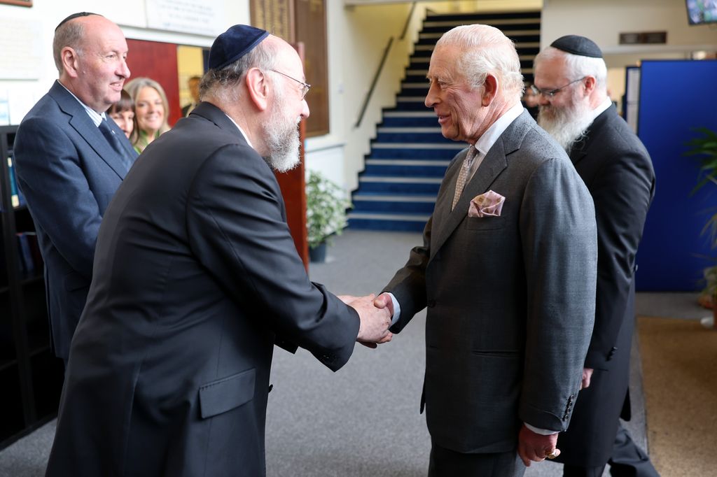 King Charles meets members of the community during a visit to Heaton Park Hebrew Congregation Synagogue