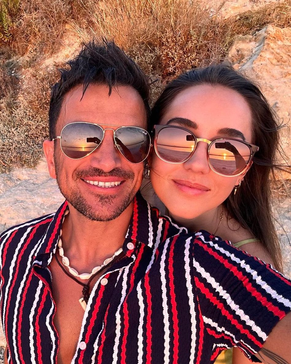 Peter and Emily Andre posing in a holiday selfie 