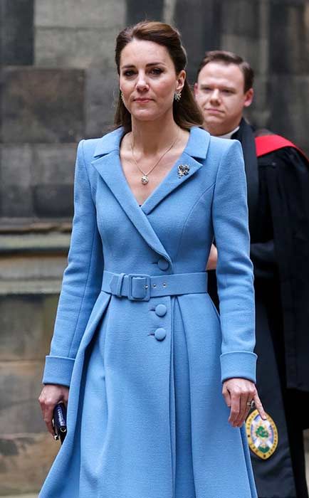 Kate Middleton stuns in Cambridge wearing long blue coat and animal print  dress today