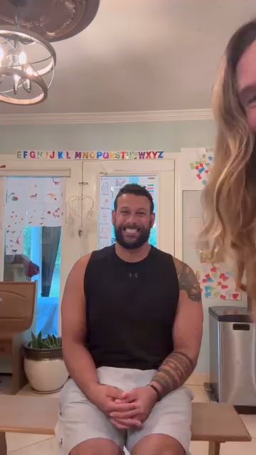 Joss Stone's husband sitting in the kitchen