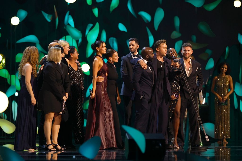 Melvin Odoom, Danny Jones and Oti Mabuse accept the 'Reality Competition' Award for 'I'm a Celeb' during the NTAs