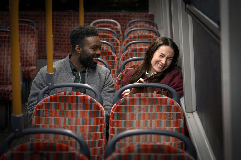 man and woman on bus