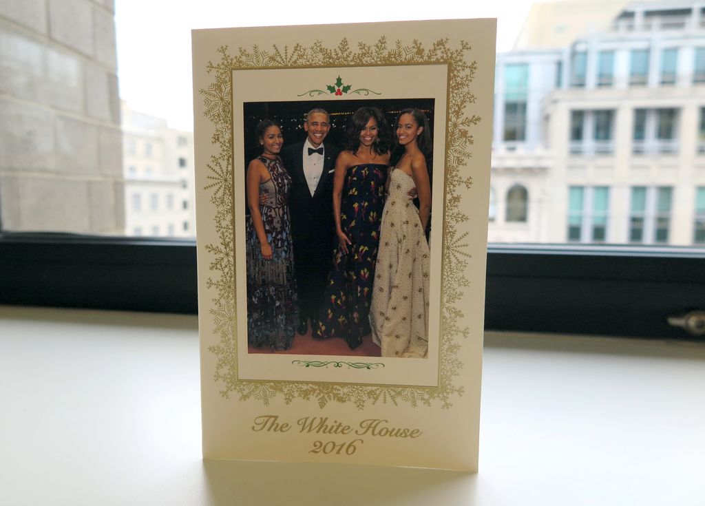 A Christmas card from the Obama family, the last that will be sent by the outgoing President of the USA in his official role, on a windowsill in Washington D.C., USA, 13 December 2016. The card is signed by Barack Obama, his wife Michelle and children Sasha and Malia as well as the pawprints of the family's two dogs Bo and Sunny.