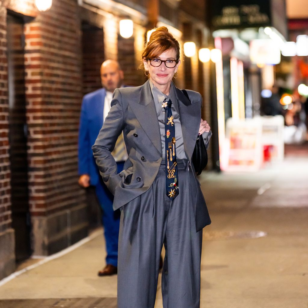 Julia Roberts in gray suit seen leaving "The Late Show With Stephen Colbert" at Ed Sullivan Theater