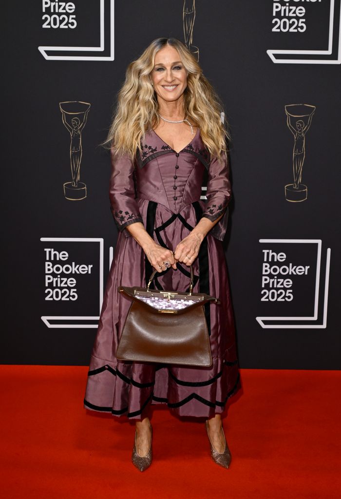 Sarah Jessica on red carpet in mauve midi gown