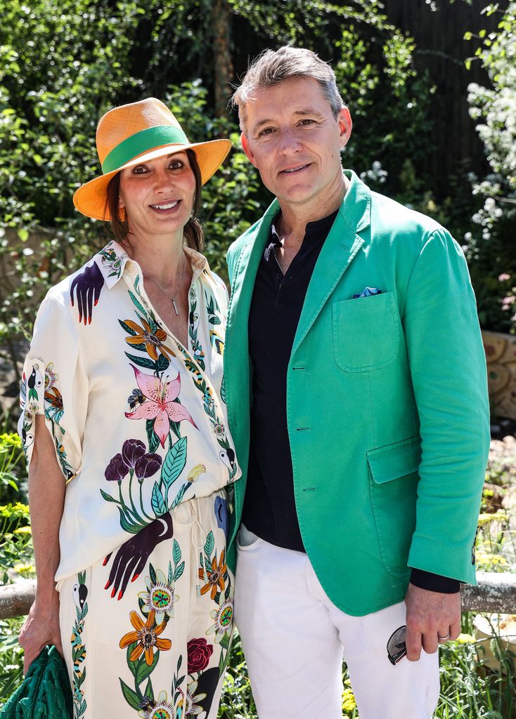 couple posing at chelsea flower show 