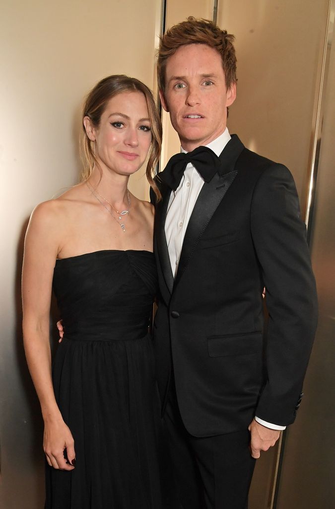 Hannah Bagshawe and Eddie Redmayne in black outfits