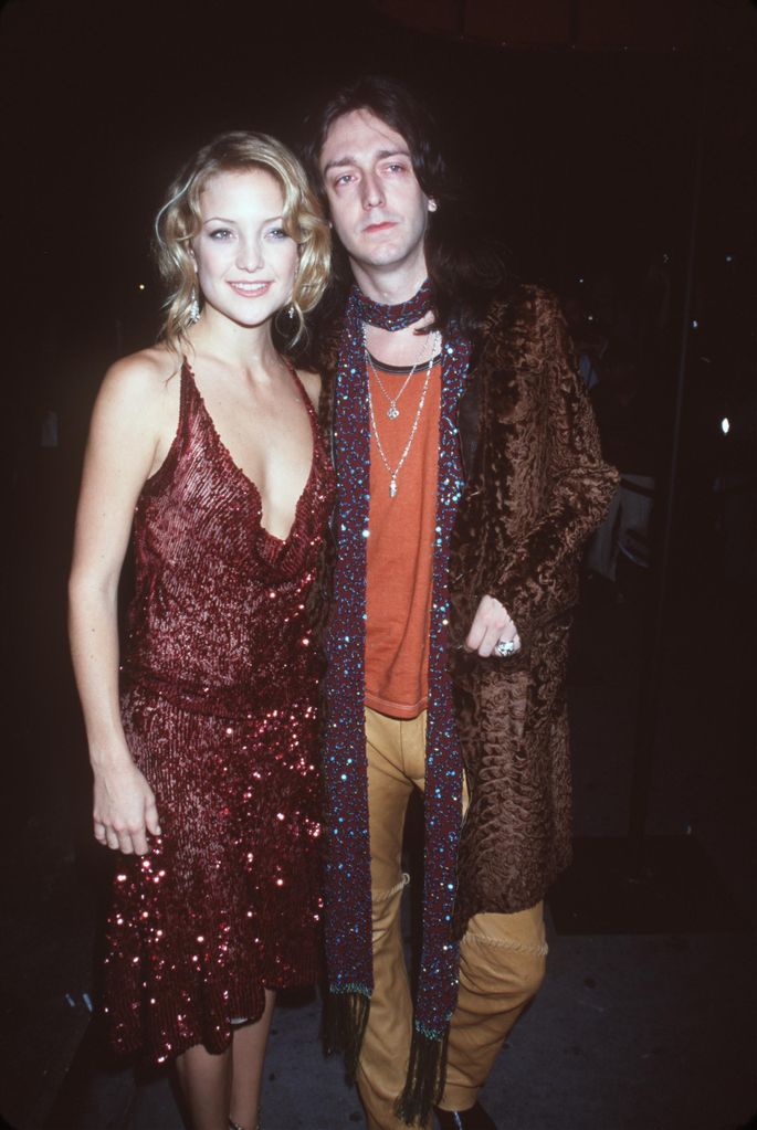 Kate Hudson with boyfriend Chris Robinson of the rock band ("Black Crowes") attends the premiere of "Almost Famous" September 11, 2000 in New York, NY