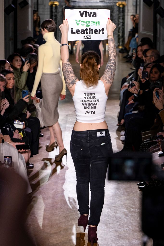 PETA protestors stormed the runway during the Victoria Beckham Ready to Wear Fall/Winter 2024-2025 fashion show as part of the Paris Fashion Week on March 1, 2024 in Paris, France. (Photo by Victor VIRGILE/Gamma-Rapho via Getty Images)
