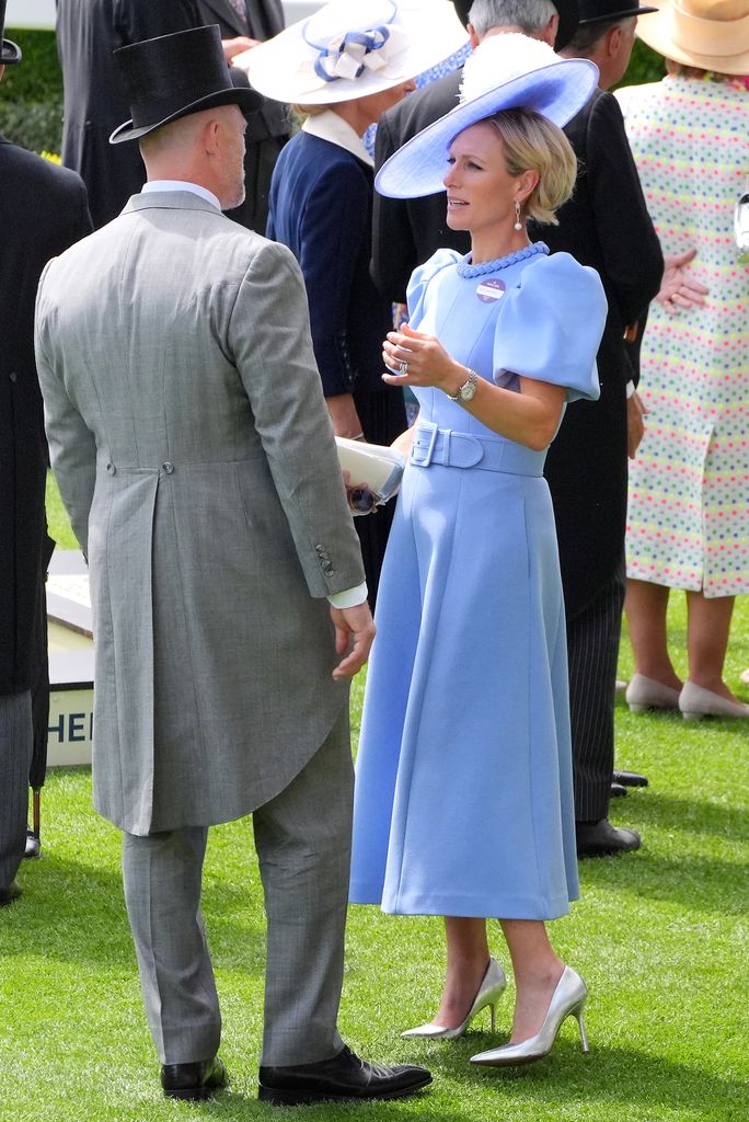 Zara Tindall (right) speaks with husband Mike Tindall (left) on day three of Royal Ascot at Ascot Racecourse, Berkshire.