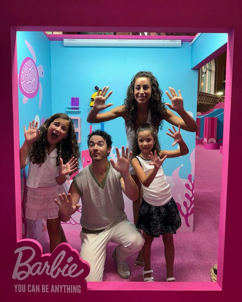 kevin jonas with wife and two kids in barbie box