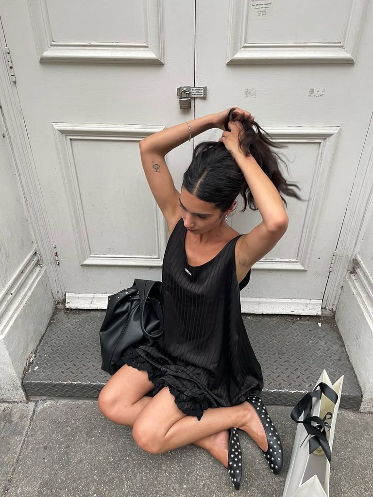 sofia wimberly in black mini dress