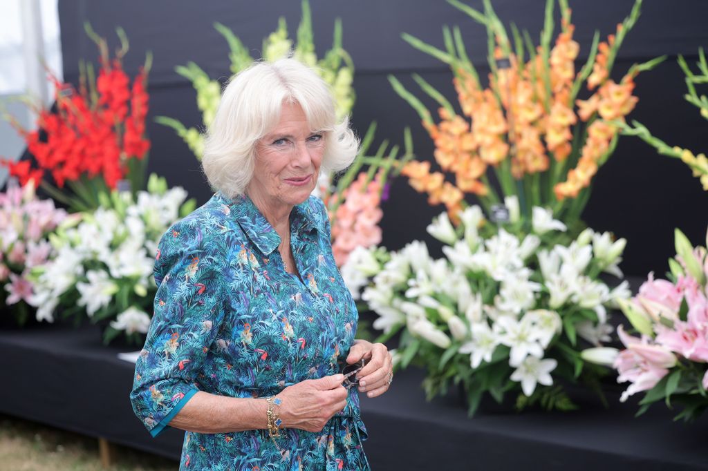 Queen Consort Camilla attending The Sandringham Flower Show 2022 wearing an near-identical bracelet