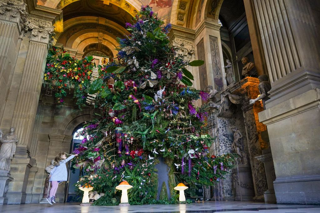 YORK, ENGLAND - NOVEMBER 10: Esme Bree, 3, from Yearsley runs past the main Christmas tree as she attends a media preview before the opening of the Neverland Christmas themed decorations at Castle Howard on November 10, 2023 in York, England. The North Yorkshire stately home transforms into Neverland from Nov 11 to Jan 2, 2024, offering a magical Peter Pan-themed Christmas with a myriad of festive activities, abundant decorations, and theatrical installations by CLW Event Design. (Photo by Ian Forsyth/Getty Images)