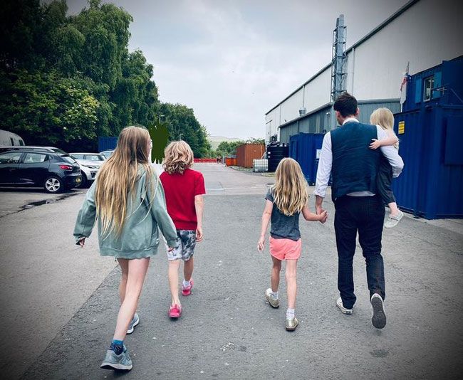 david tennant walking with his four youngest children