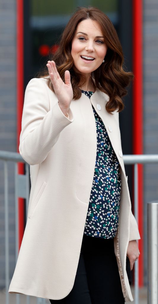 A photo of Princess Kate wearing a beige coat in 2018