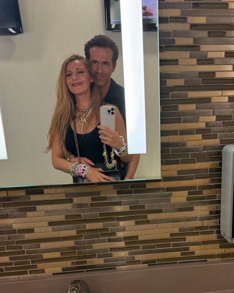 Ryan Reynolds hugs Blake Lively in a bathroom while in New Orleans to watch Taylor Swift's Eras Tour, shared on Instagram