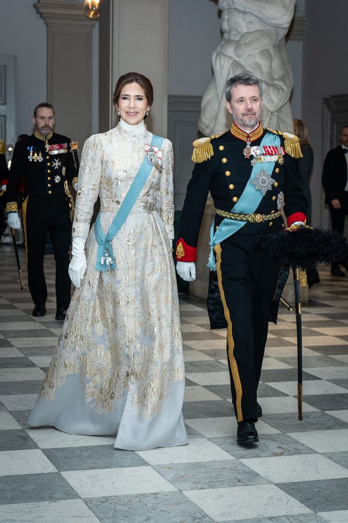 Queen Mary wowed in gold brocade gown