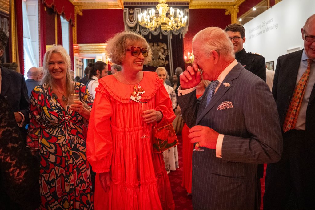 King Charles III speaks with Grayson Perry during a reception at St James's Palace, London, to celebrate 25 years of the Royal Drawing School