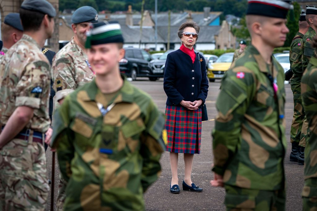 Princess Royal in tartan skirt and navy jacket at Royal Edinburgh Military Tattoo at Redford Barracks 