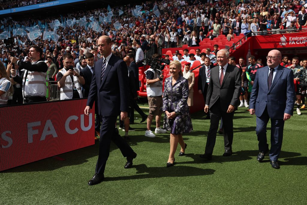 Prince William, Prince of Wales, walks out onto the pitch prior to the Emirates FA Cup Final match between Manchester City and Manchester United at Wembley Stadium 