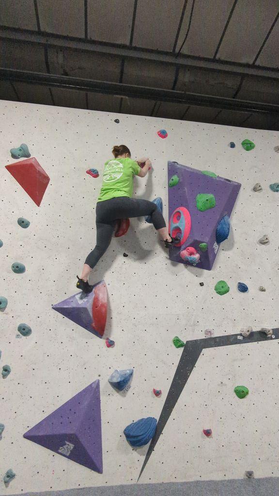 Woman on a climbing wall