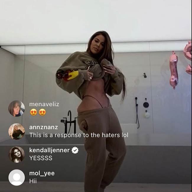 khloe kardashian shows off body