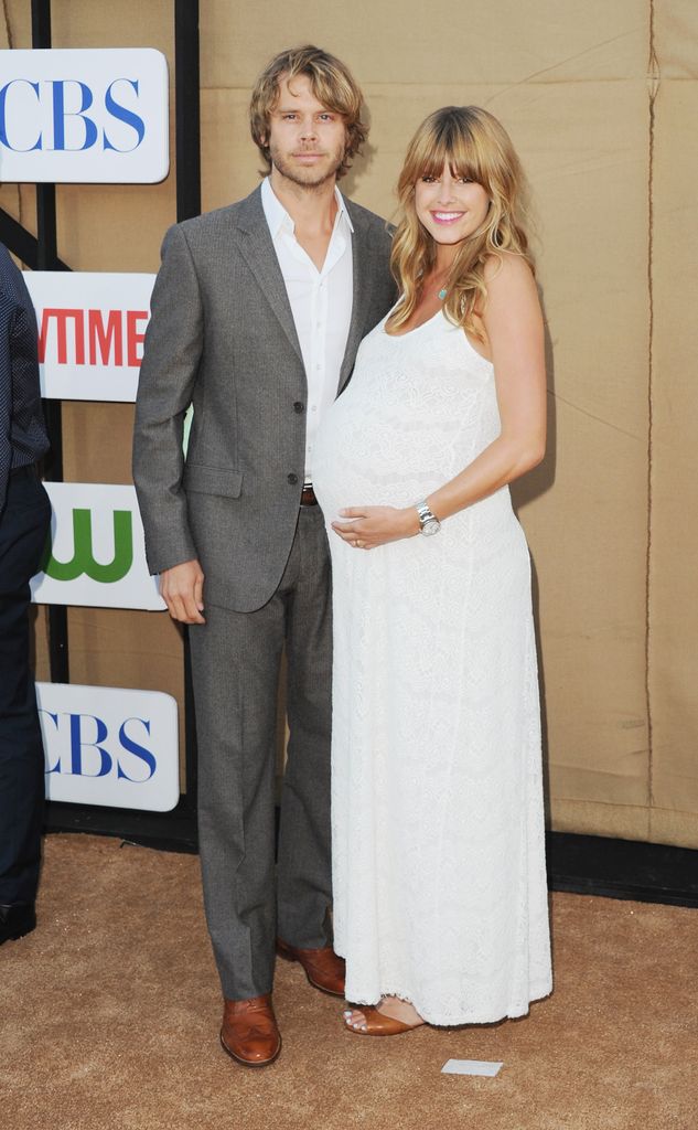 Eric Christian Olsen and wife Sarah Wright on the red carpet 