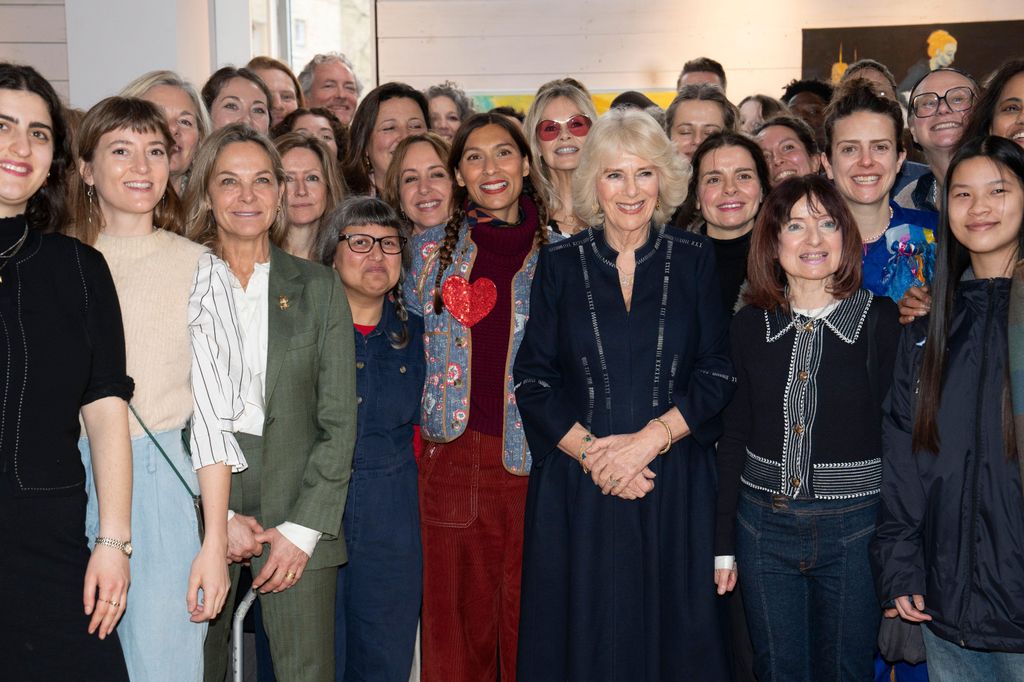 Queen Camilla with artists at Kindred Studios' pop-up hub