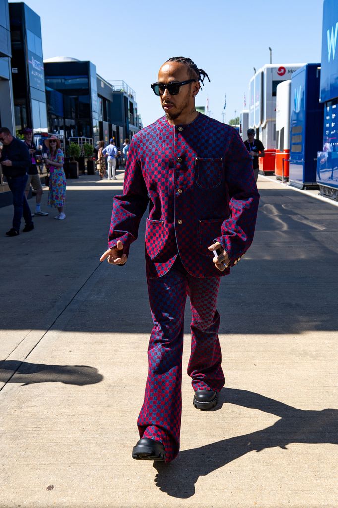 British driver for Mercedes AMG F1 team Lewis Hamilton enters the paddock during practice ahead of the F1 Grand Prix of Great Britain at Silverstone Circuit on July 7, 2023 in Northampton, United Kingdom. (Photo by Kym Illman/Getty Images)