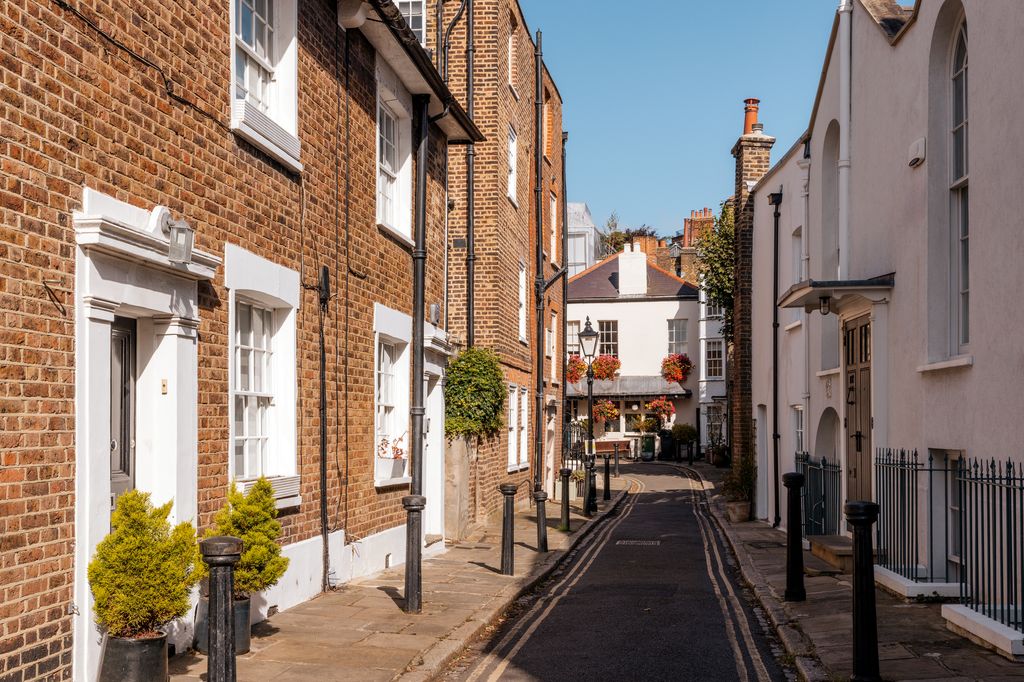 Idyllic street in Hampstead on a sunny day, London, England, United Kingdom