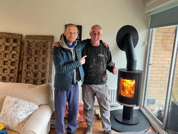 Jonnie Irwin with stove fitter