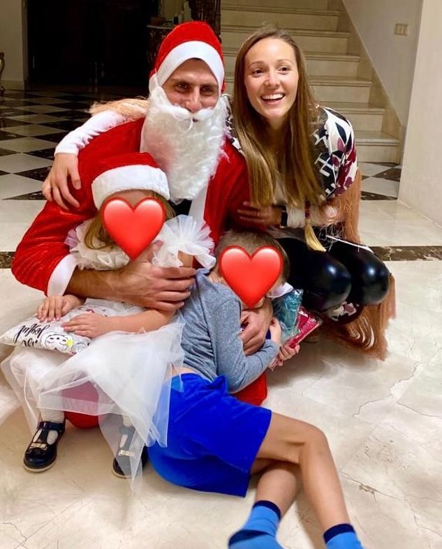 Novak Djokovic dressed as Santa Claus with Jelena, Tara and Stefan Djokovic
