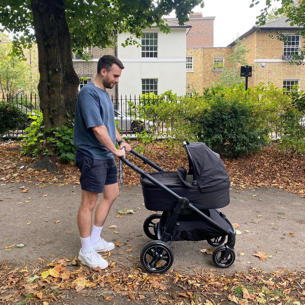 Rosie shared a sweet photo of her fiance pushing baby Billie in North London