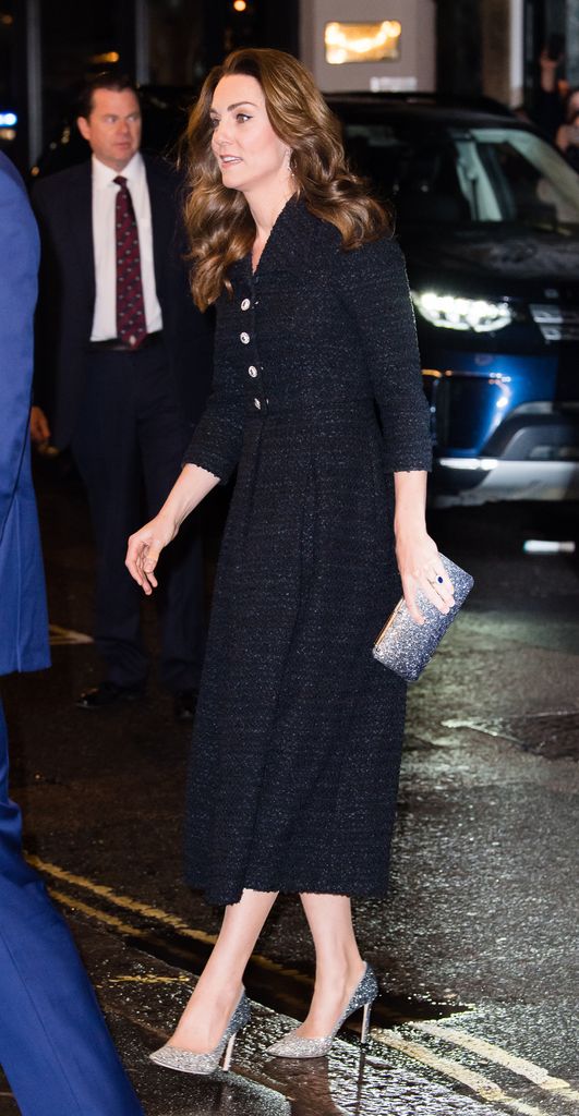 Kate at night in navy dress and glittery heels