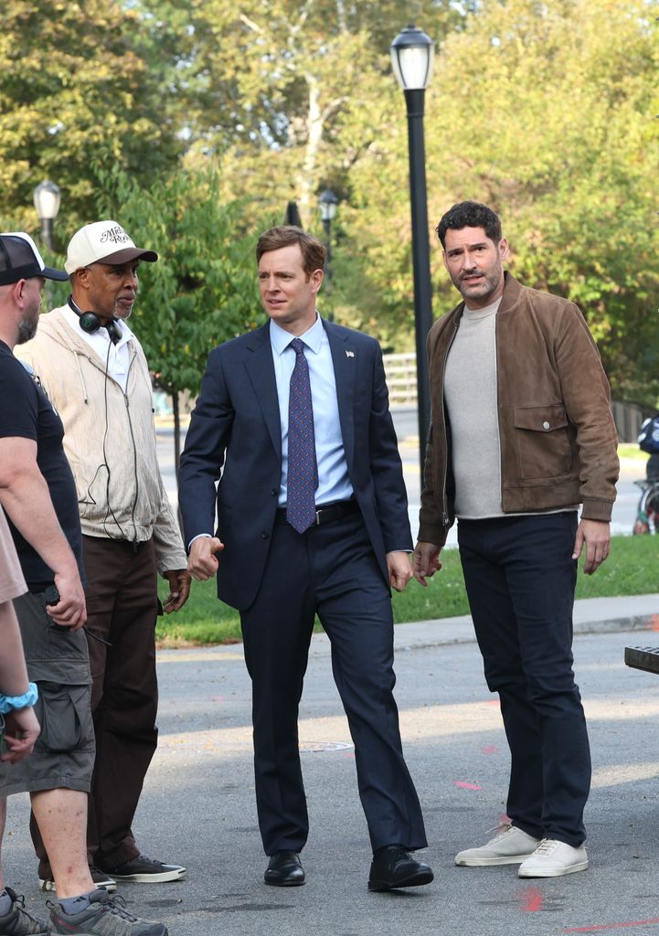 Nick Gehlfuss and Tom Ellis are seen on the set of "CIA" in Flushing Meadows Park, Queens on September 23, 2025 in New York City