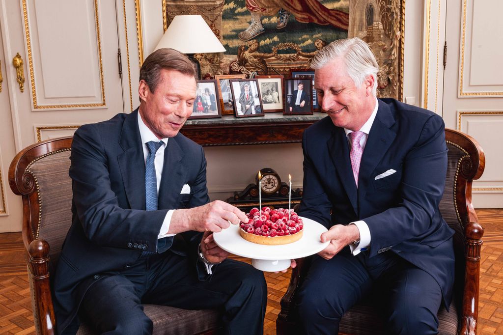 King Philippe and Grand Duke Henri with a cake on their birthdays