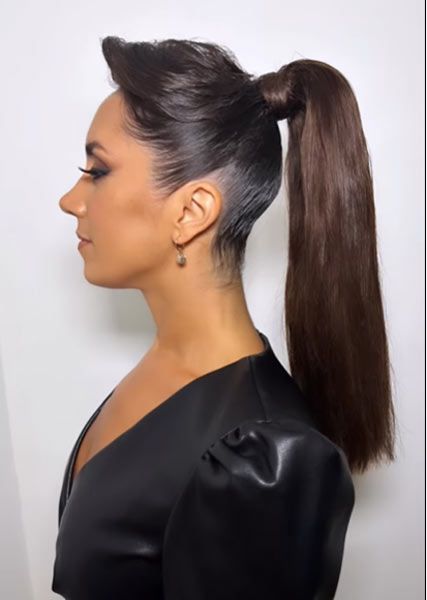 Janette Manrara wears ponytail in black leather dress