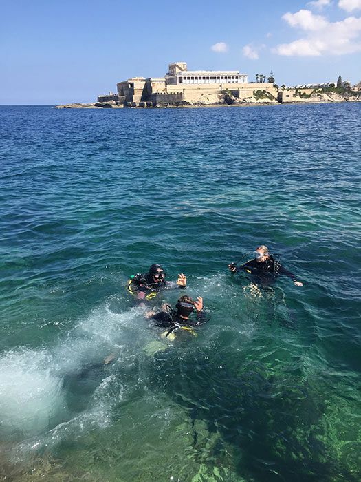 Diving off Lido at Corinthia St Georges