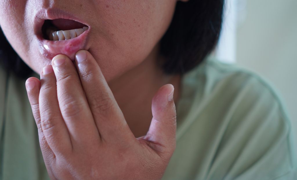 woman looking at mouth