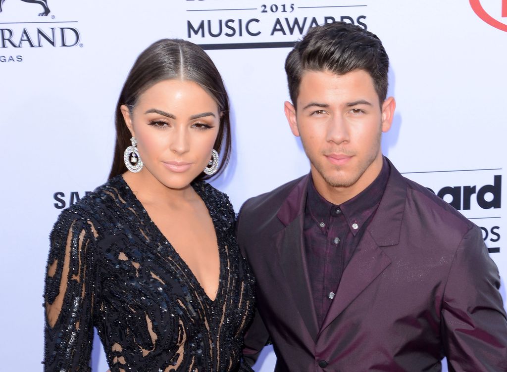 LAS VEGAS, NV - MAY 17:  Singer Nick Jonas (R) and model Olivia Culpo attend the 2015 Billboard Music Awards at MGM Grand Garden Arena on May 17, 2015 in Las Vegas, Nevada.  (Photo by C Flanigan/Getty Images)