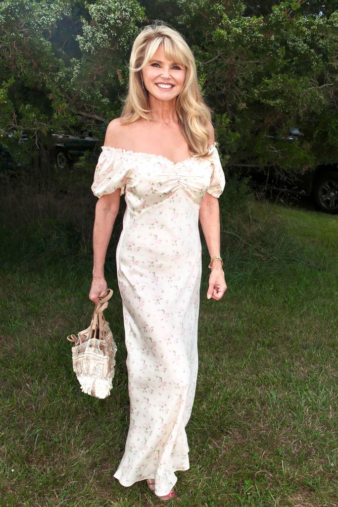 Christie Brinkley wears a white floral dress