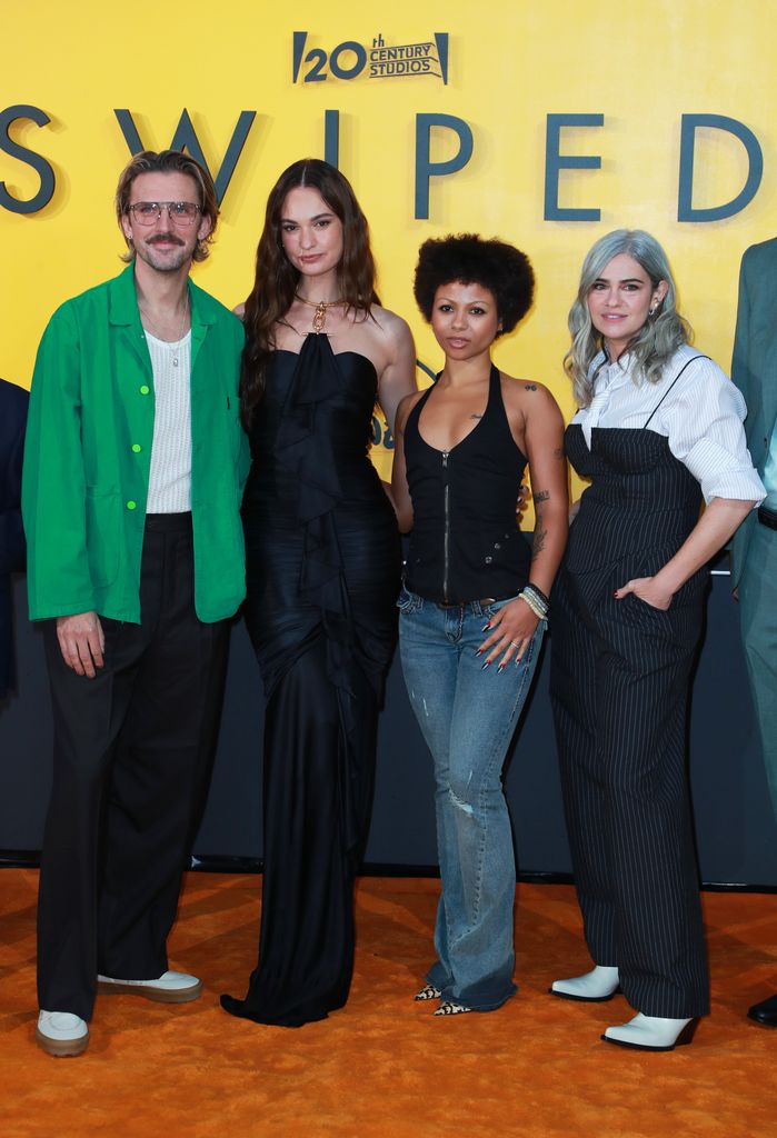 Lily James, Myha'la Herrold and Rachel Lee Goldenberg attend the European Premiere of "Swiped", all standing In front of a yellow "Swiped sign"